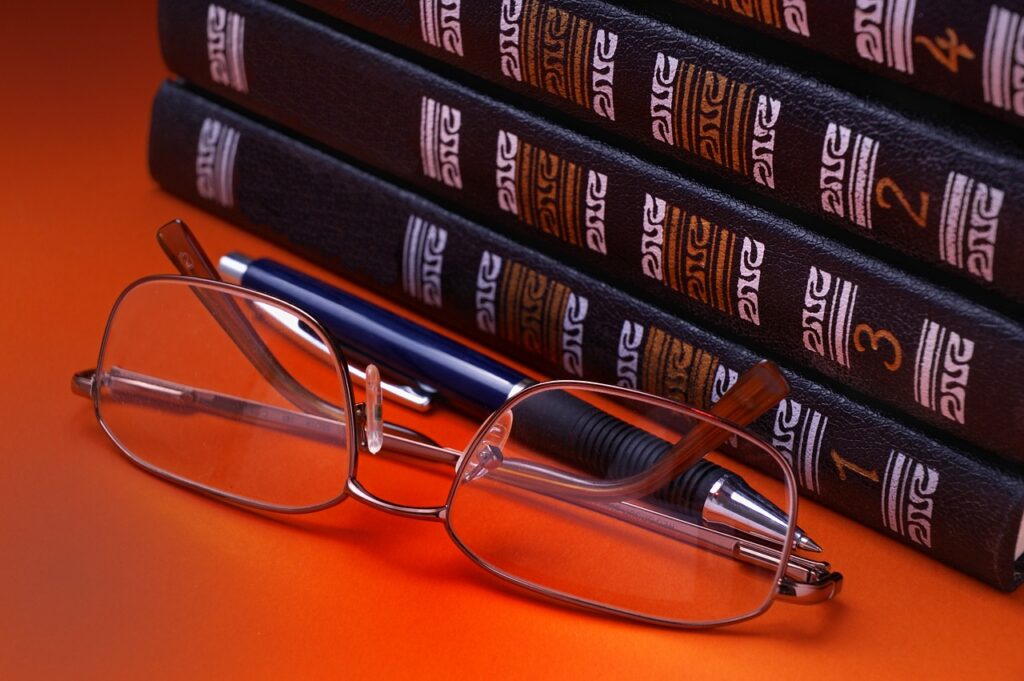 glasses, book, paper